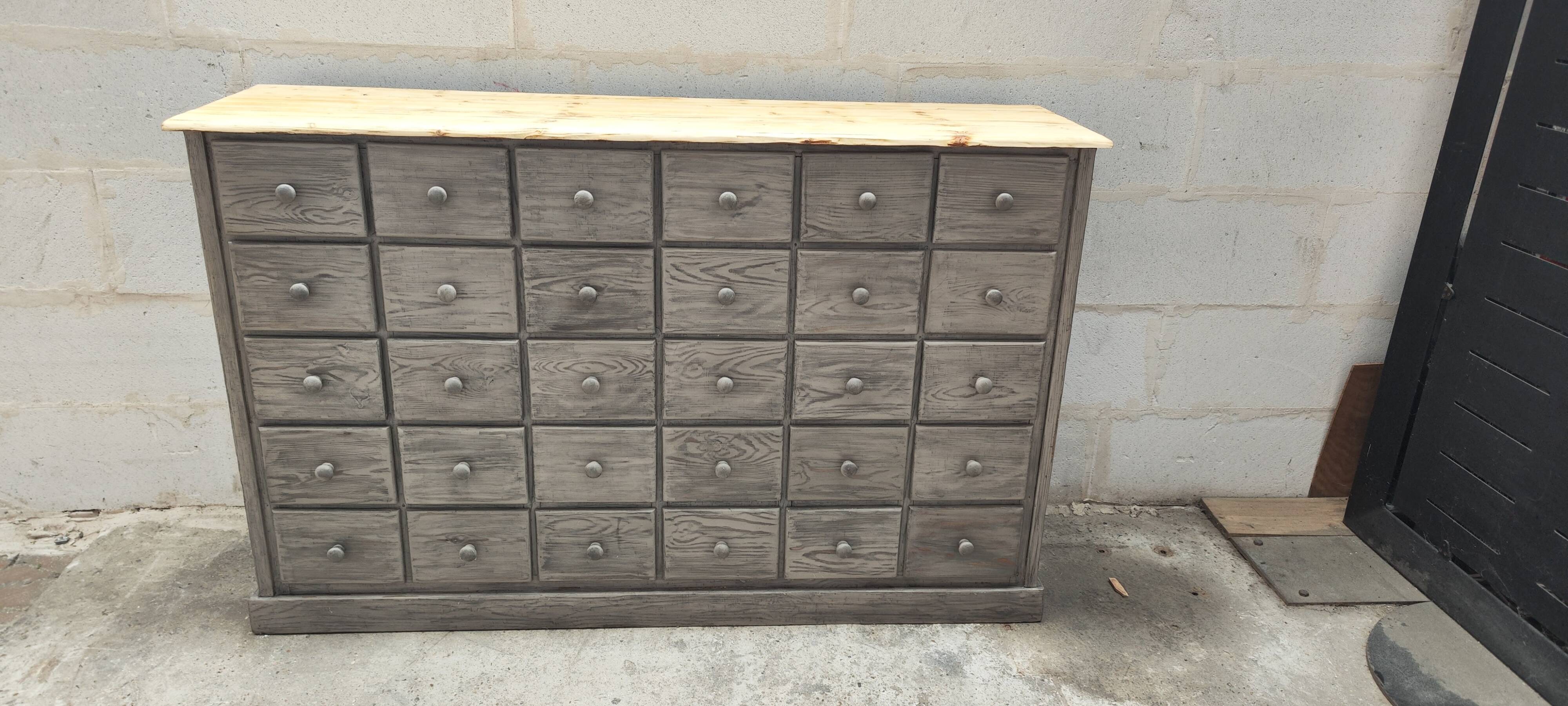 Old trade furniture with thirty drawers