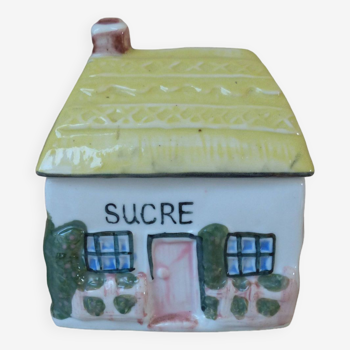 Old sugar box in the shape of a hand-painted ceramic house