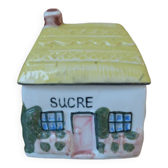 Old sugar box in the shape of a hand-painted ceramic house