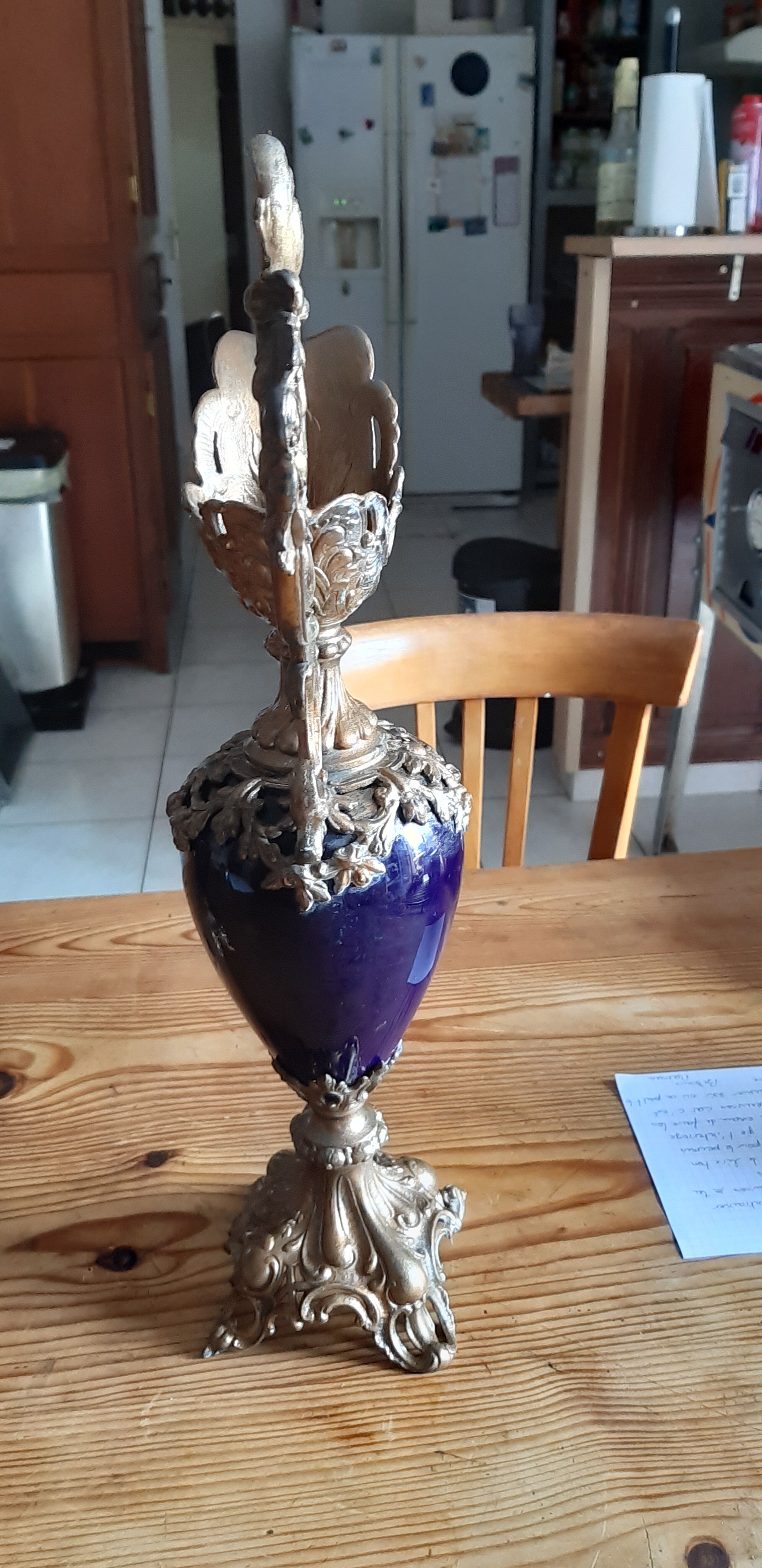 Pair of golden regulated ewers and blue glass