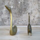 Cat and brass swan