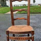 Chaise basse paillee dite chauffeuse