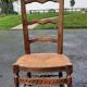Chaise basse paillee dite chauffeuse