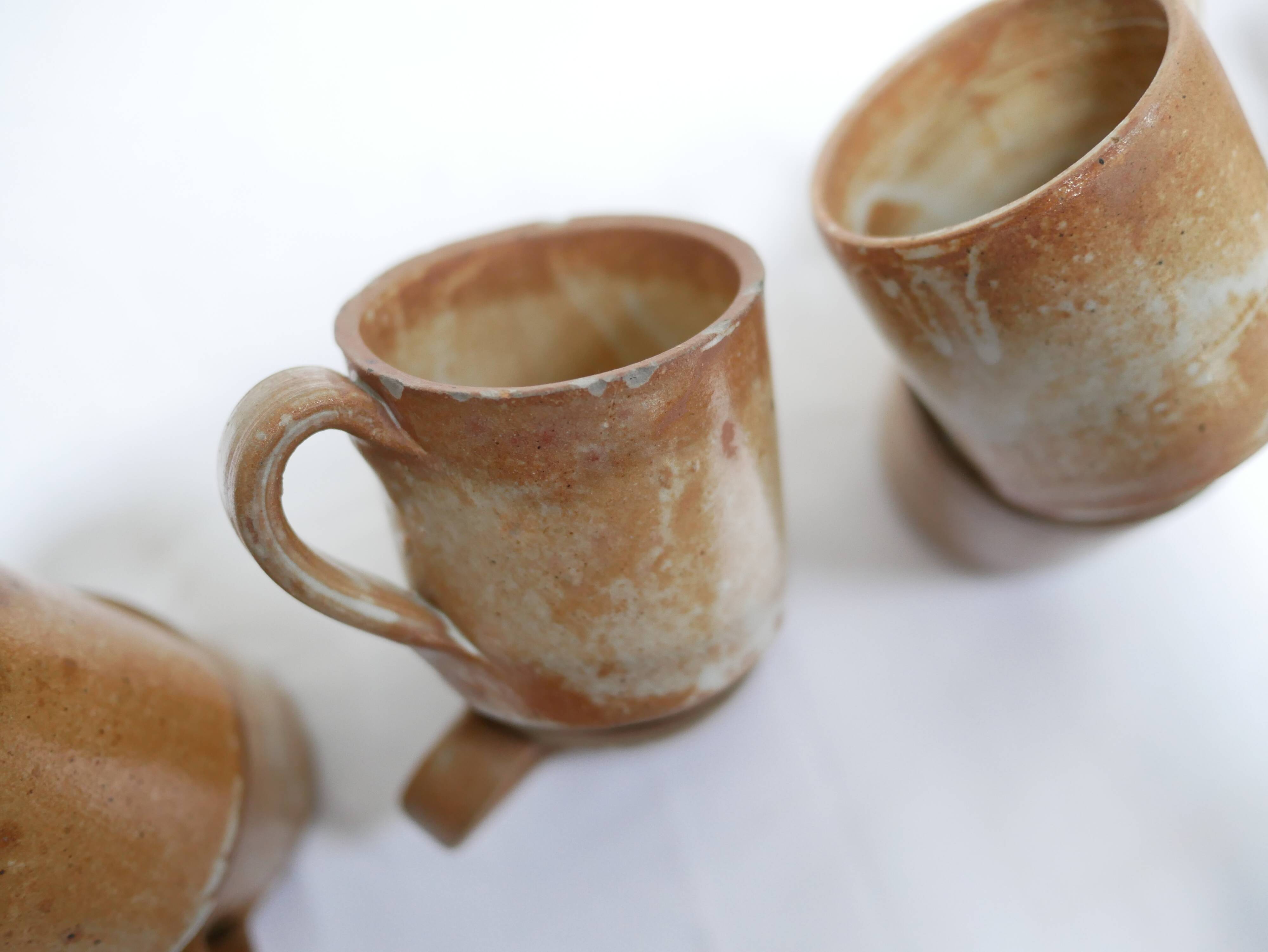 Series of 8 cups and vintage stoneware cups