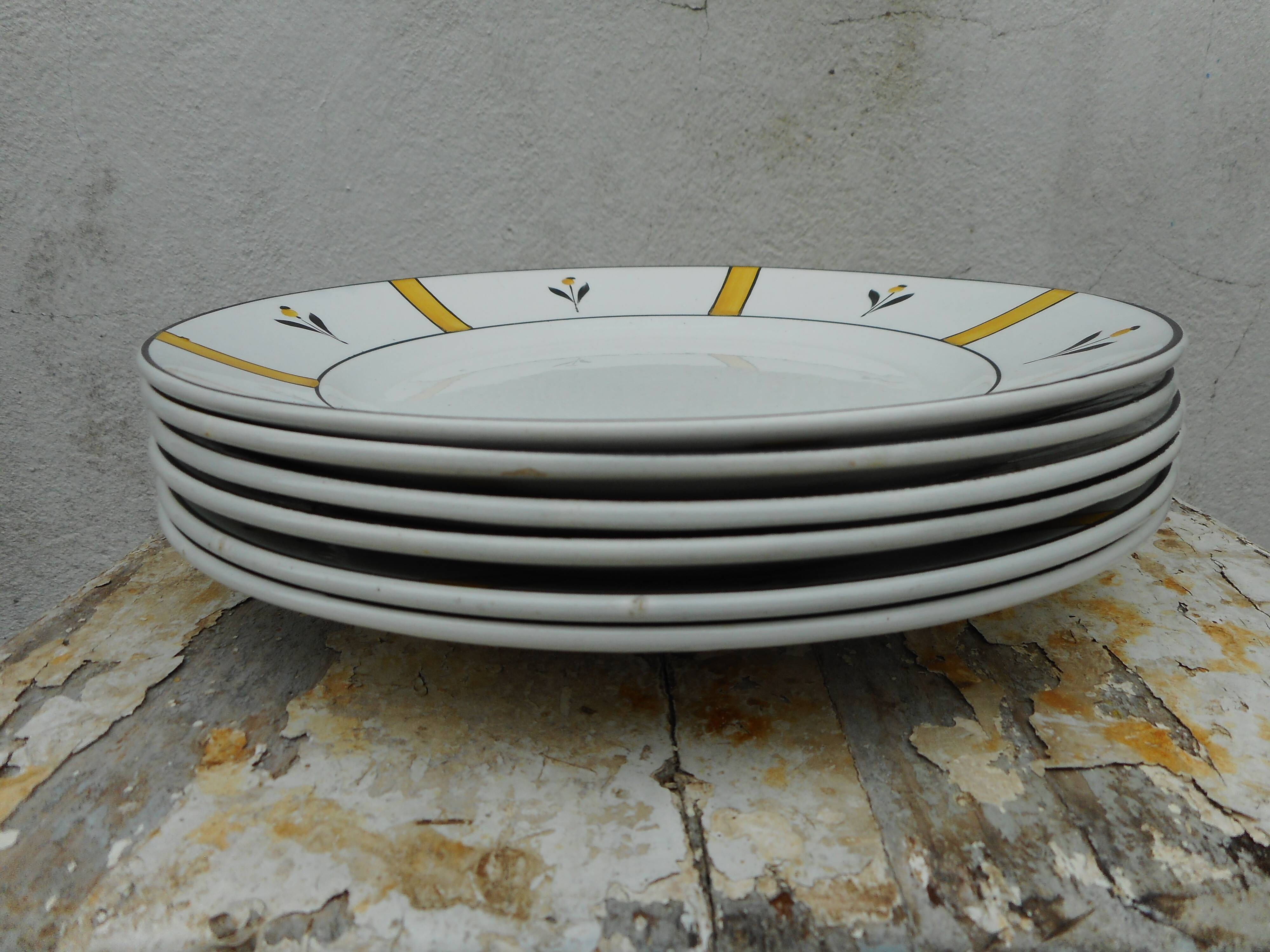 Six flat plates made of earthenware
