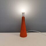 Ceramic table lamp with partial orange glaze.