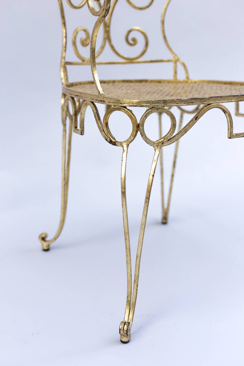 Pair of wrought iron and gilded armchairs, circa 1990