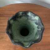 Ancient Greek style ceramic vase with curls
