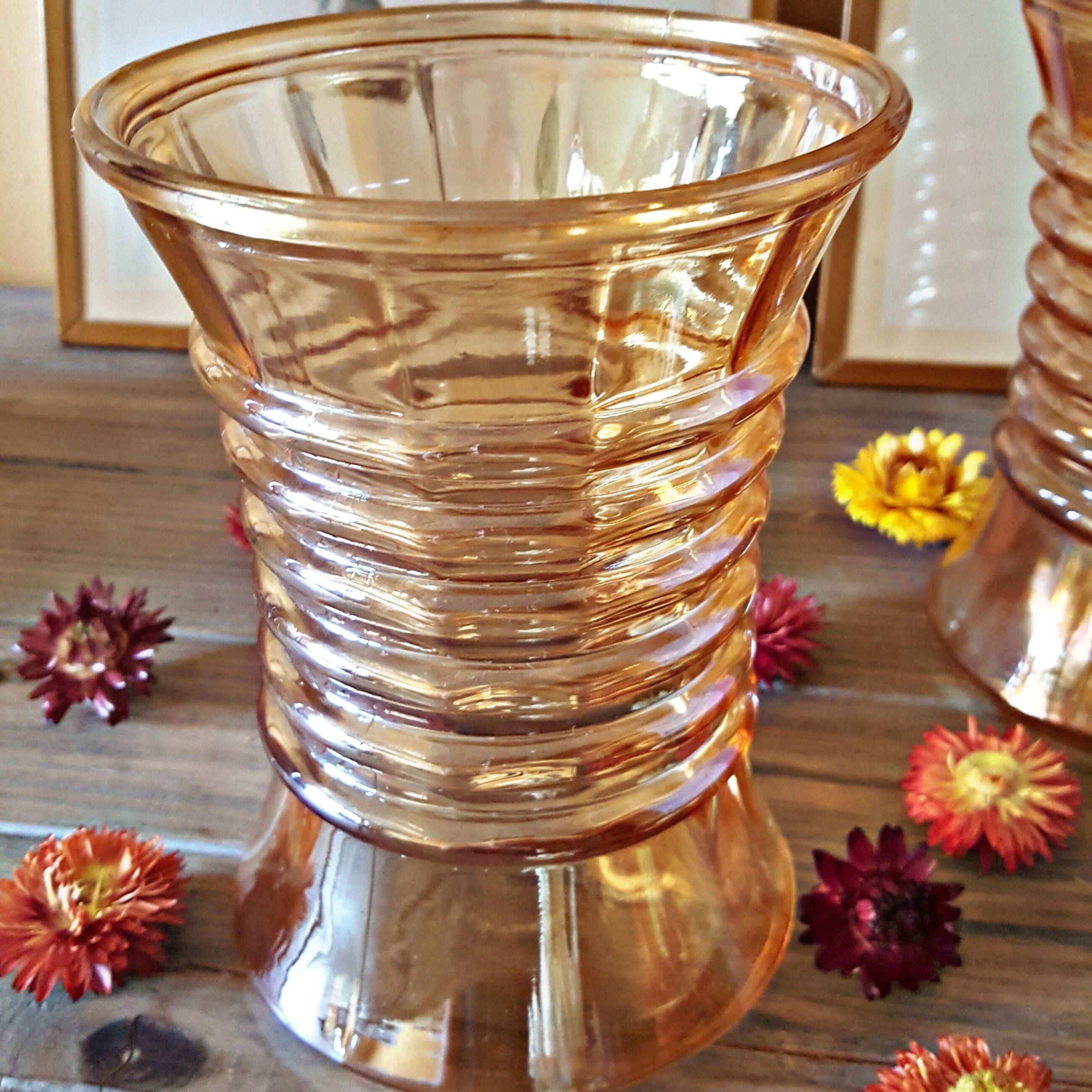 Pair of vintage orange-colored glass vases