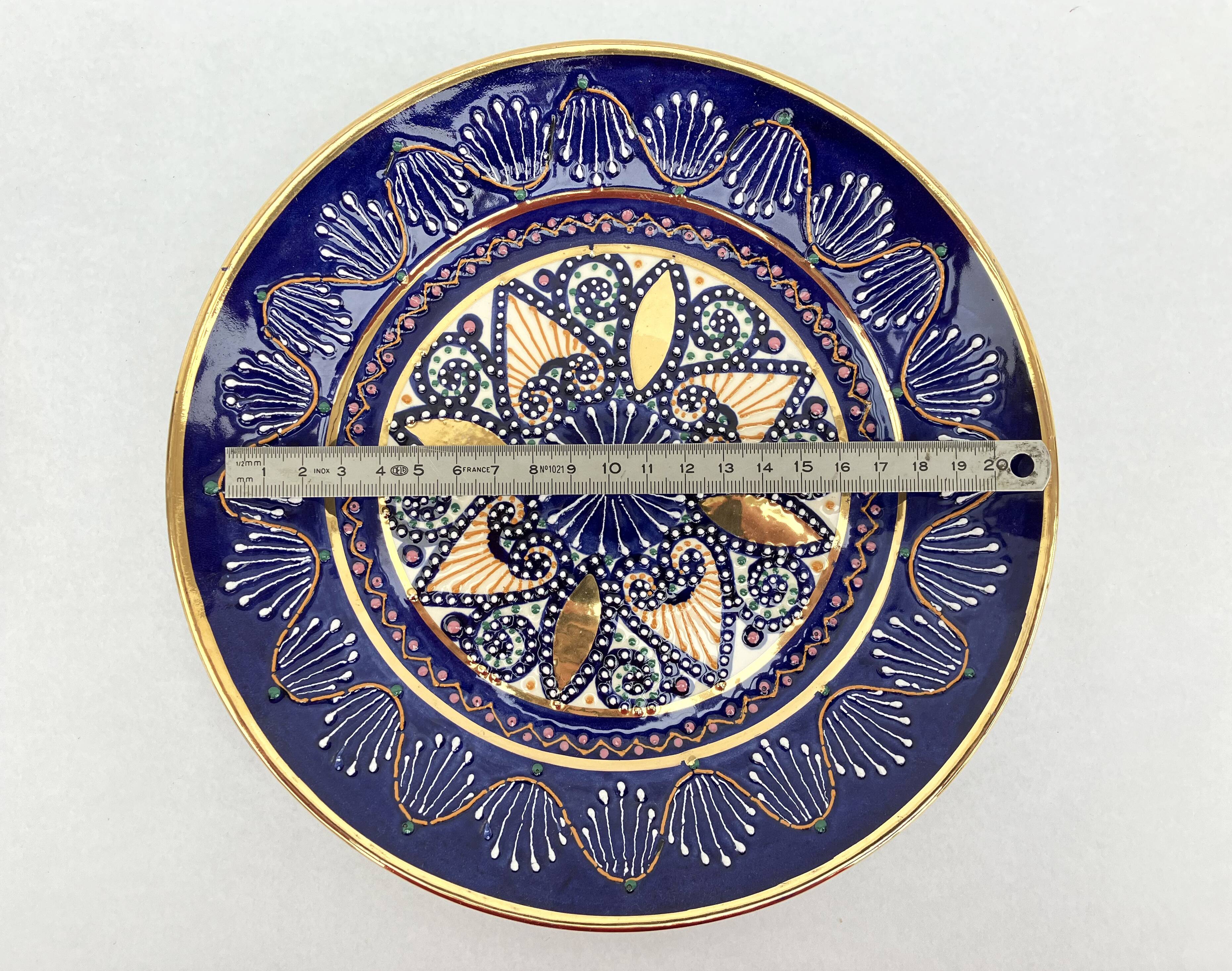 2 enamelled earthenware plates signed HB Quimper • Embroidery or beaded decoration by Pierre Poquet in relief