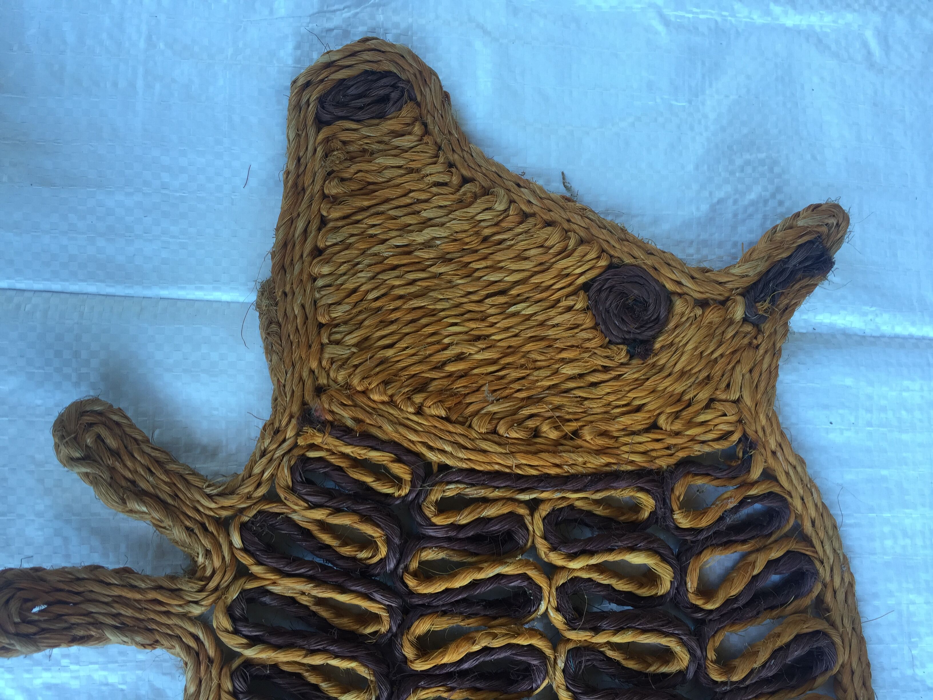 Trio of vintage rope animals table mats