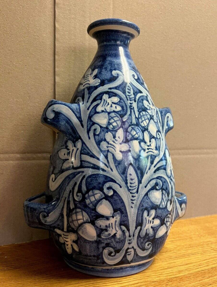 blue and white glazed earthenware vase circa 1900