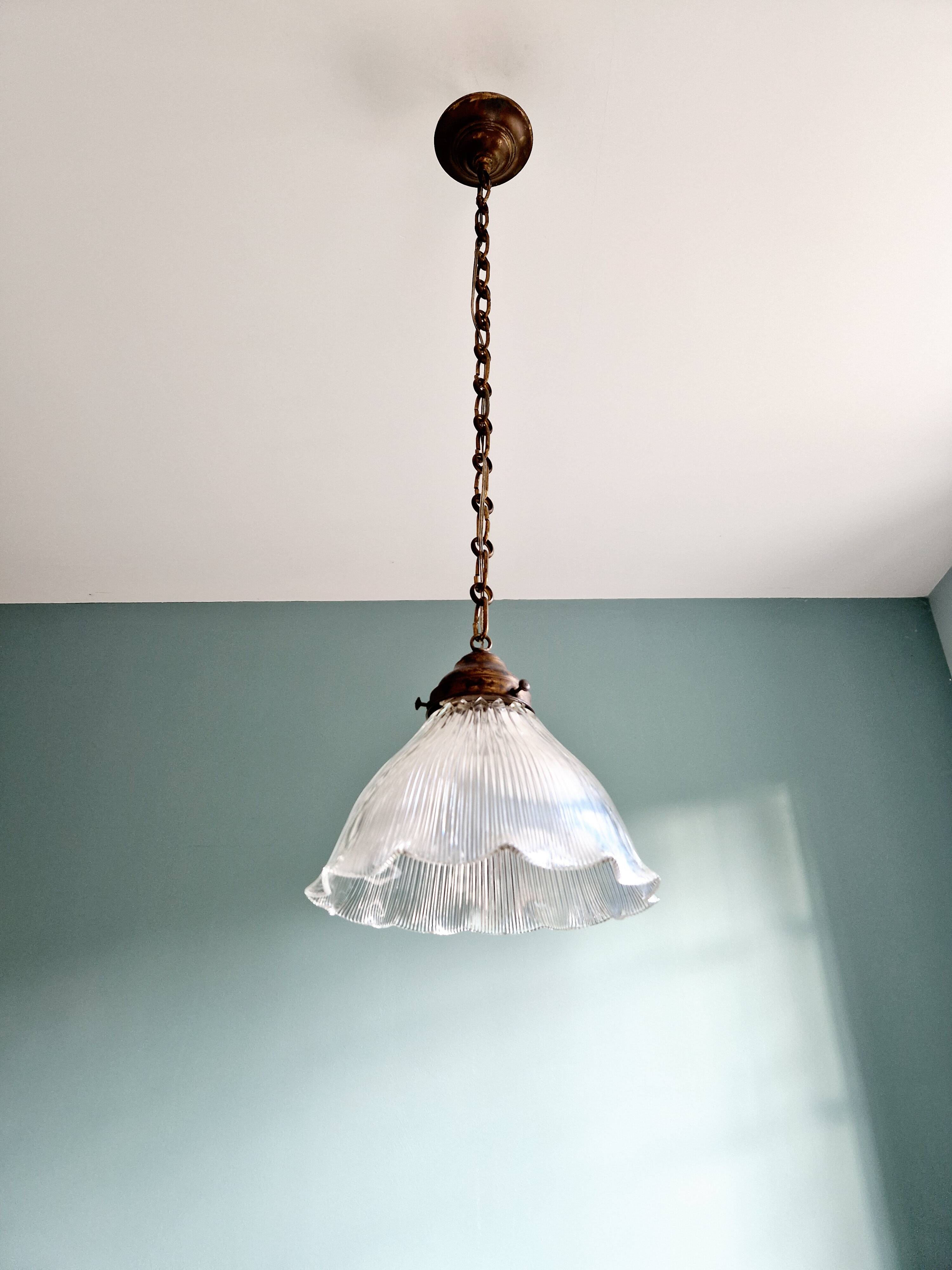 Large Holophane pendant light in transparent grooved glass