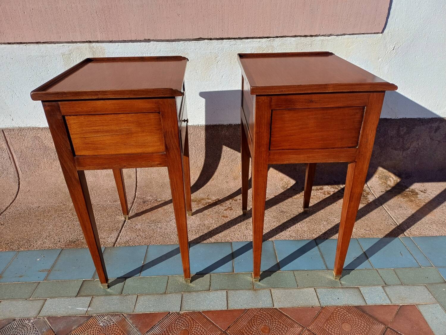 Pair of Louis XVI style oak bedside tables with 2 drawers and spindle legs