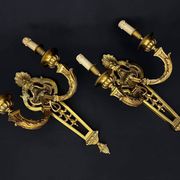 Large pair of gilt bronze wall sconces in the Louis XVI style.