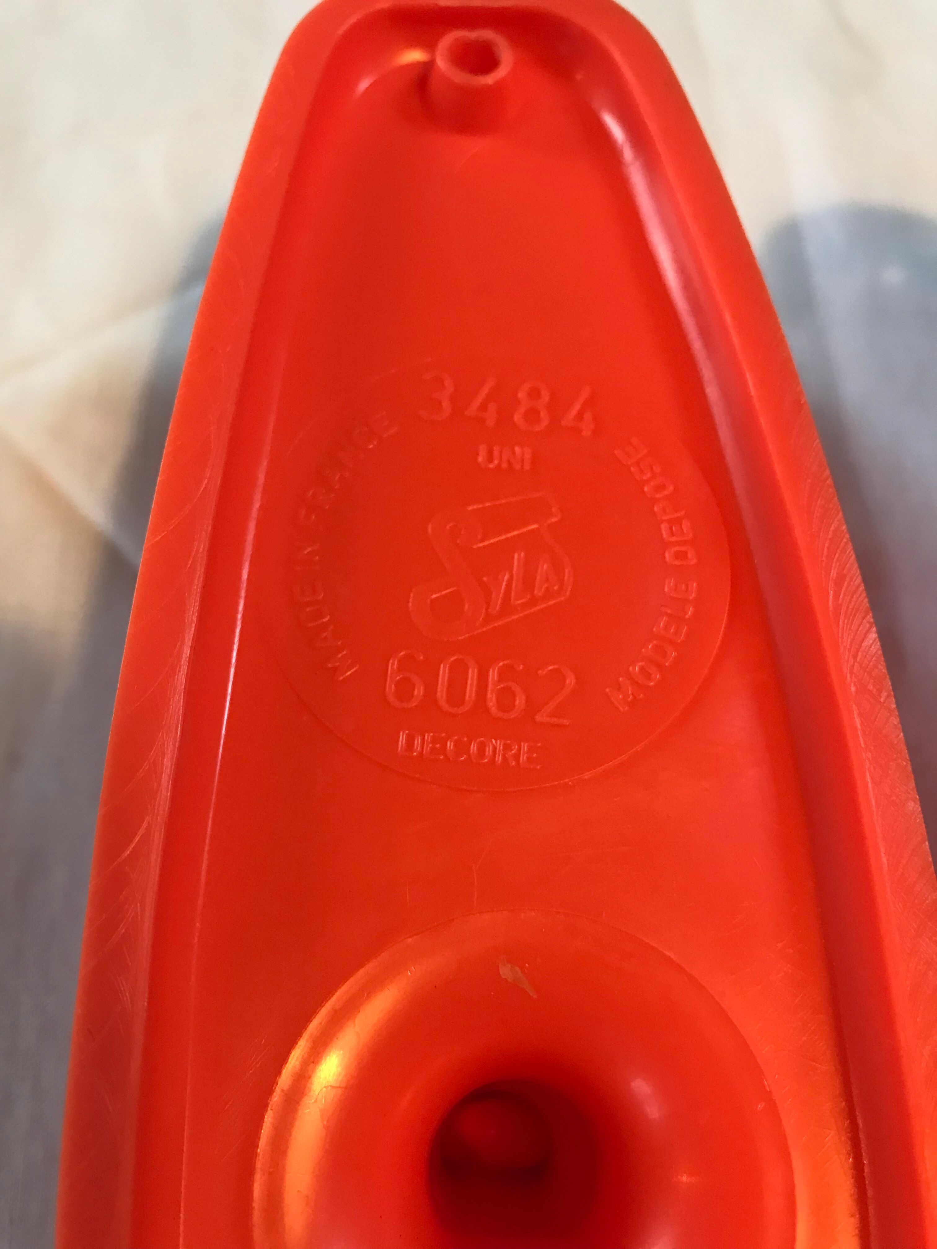 2 orange plastic hooks 70s.