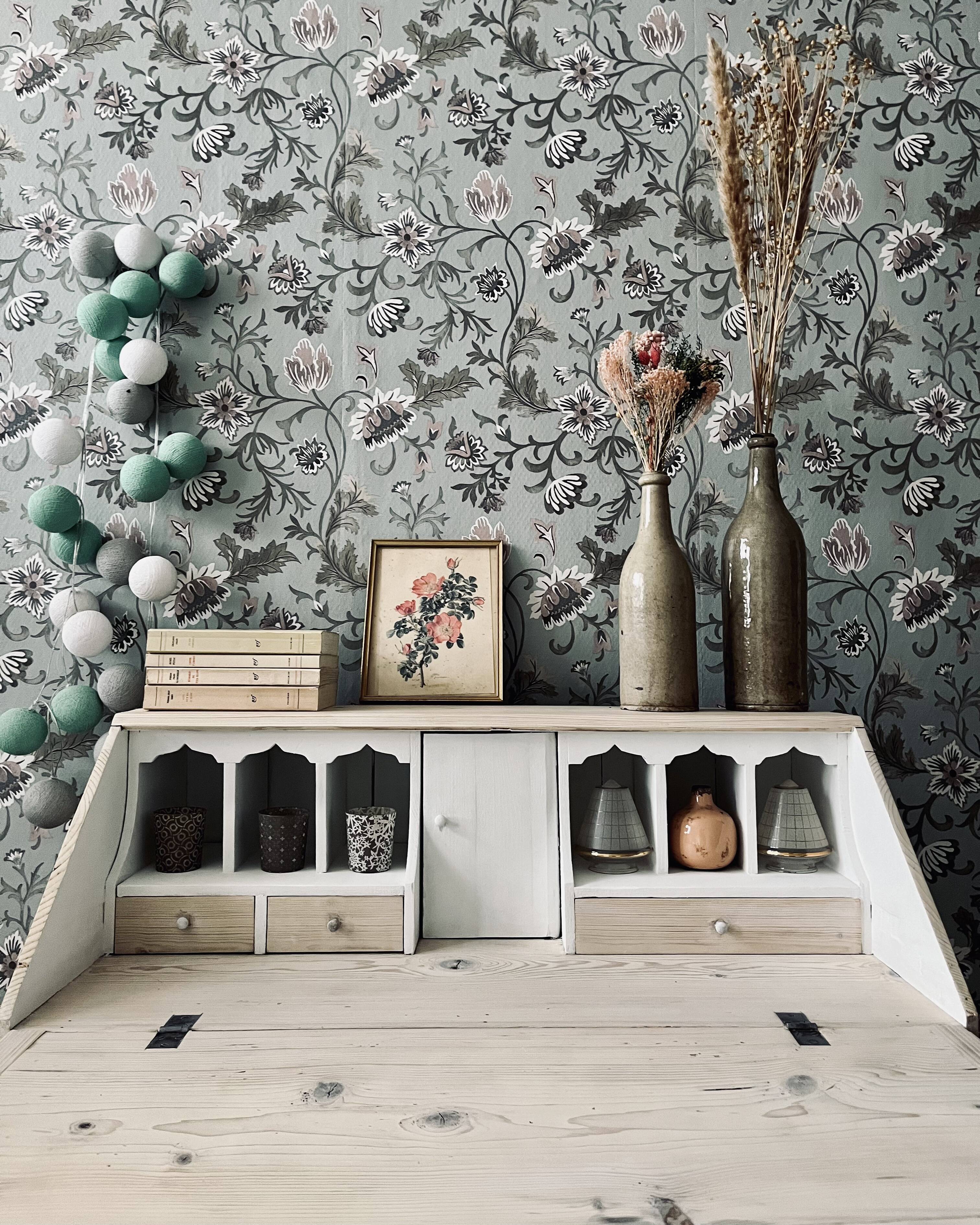 English chest of drawers topped with a sloping secretary