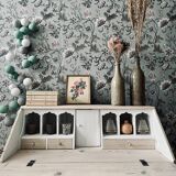 English chest of drawers topped with a sloping secretary