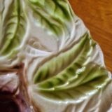 Large vintage earthenware dish with a fruit pattern.