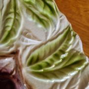 Large vintage earthenware dish with a fruit pattern.
