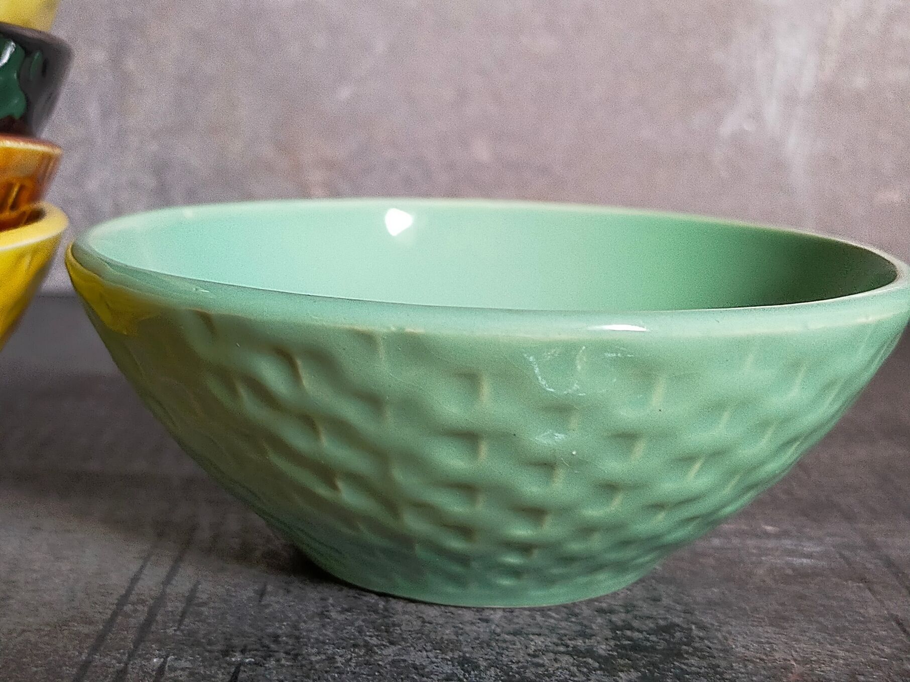 Seven vintage slip ceramic bowls