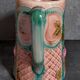 Antique slip pitcher with blooming roses
