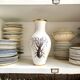 White and gold porcelain vase with black patterns by Mauricio Ortiz