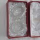 Antique crystal salt and pepper shakers, with their small spoon