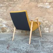 Fauteuil vintage pieds compas et accoudoirs en bois massif, since 1950