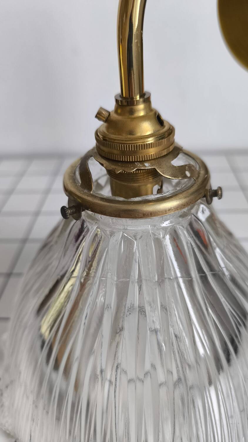 Large wall light in holophane glass and brass