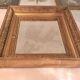 Miroir époque Restauration en bois doré à la feuille