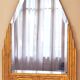 Antique Art Deco mercury mirror, in carved wood with gold leaf.
