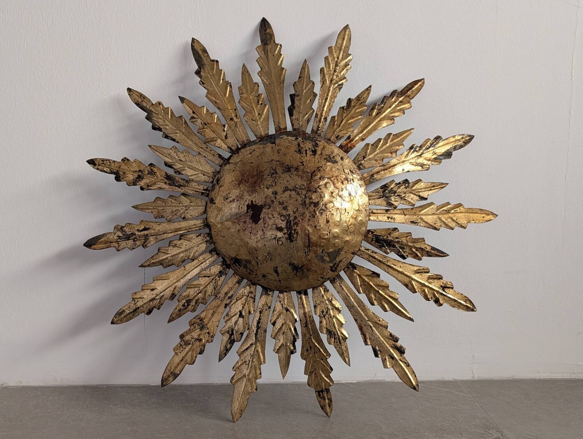 Mid-century sun ceiling lamp in gilded metal with leaf rays, 1950s