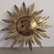 Mid-century sun ceiling lamp in gilded metal with leaf rays, 1950s