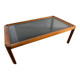 Large Scandinavian coffee table in teak and smoked glass.