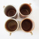 Quatre tasses en grès du Marais