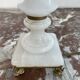 Alabaster lamp, twisted, gadroon decoration, gilded brass base, dolphins