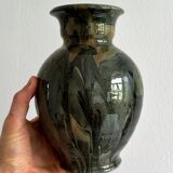 Signed ceramic vase.