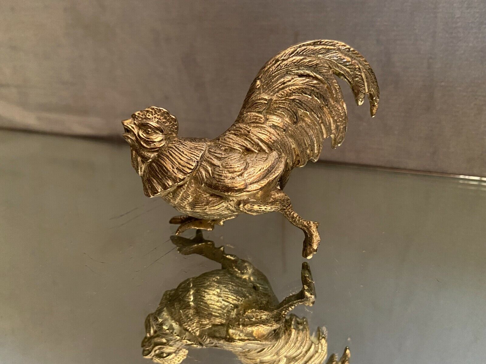 Subject to the silver metal rooster