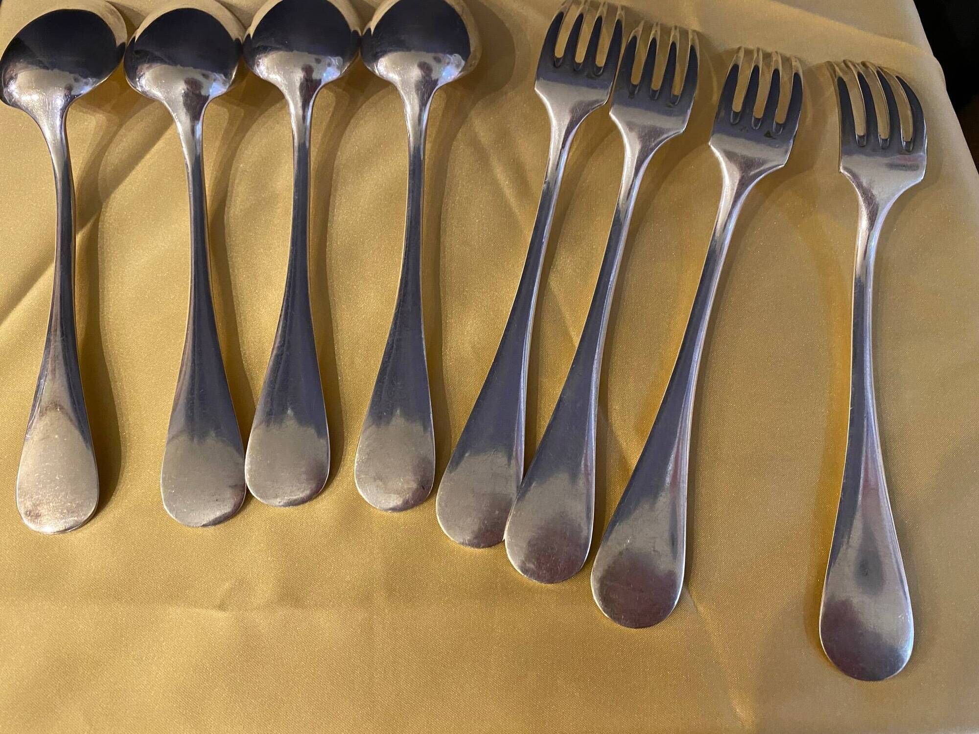 Series of 4 silver metal cutlery uniplat net model spoons forks