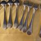 Series of 4 silver metal cutlery uniplat net model spoons forks