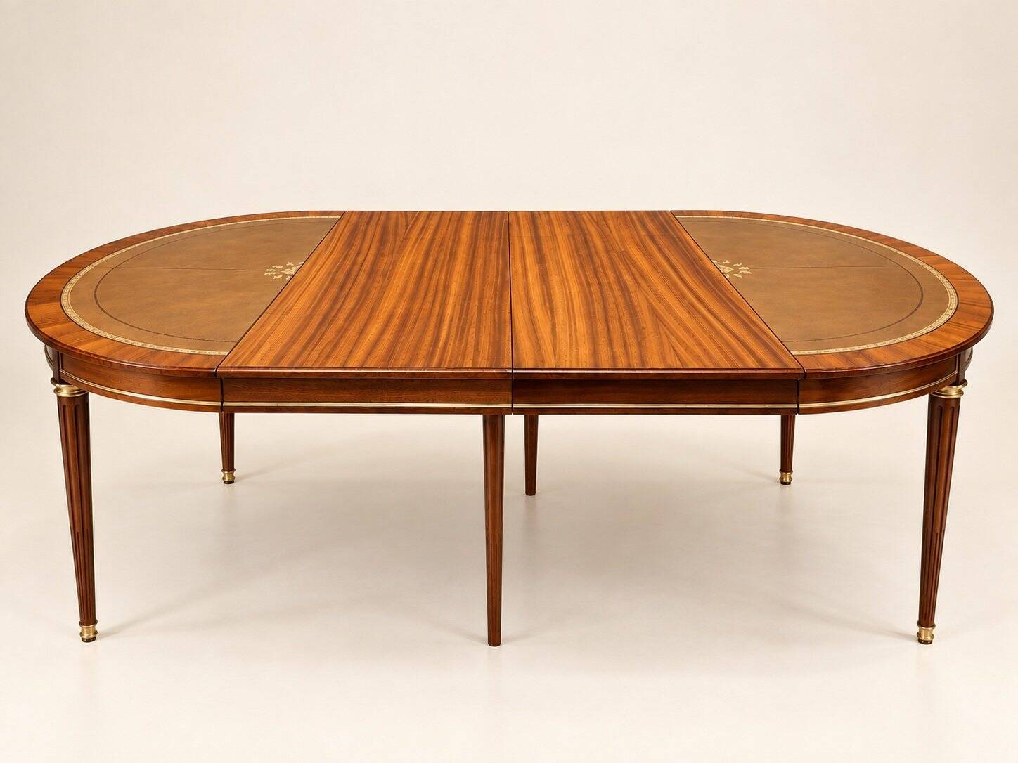 Extendable dining table – Louis XVI style – Mahogany, leather, brass