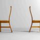 Sculptural postmodern dining chairs in wood with curved back, 1980s