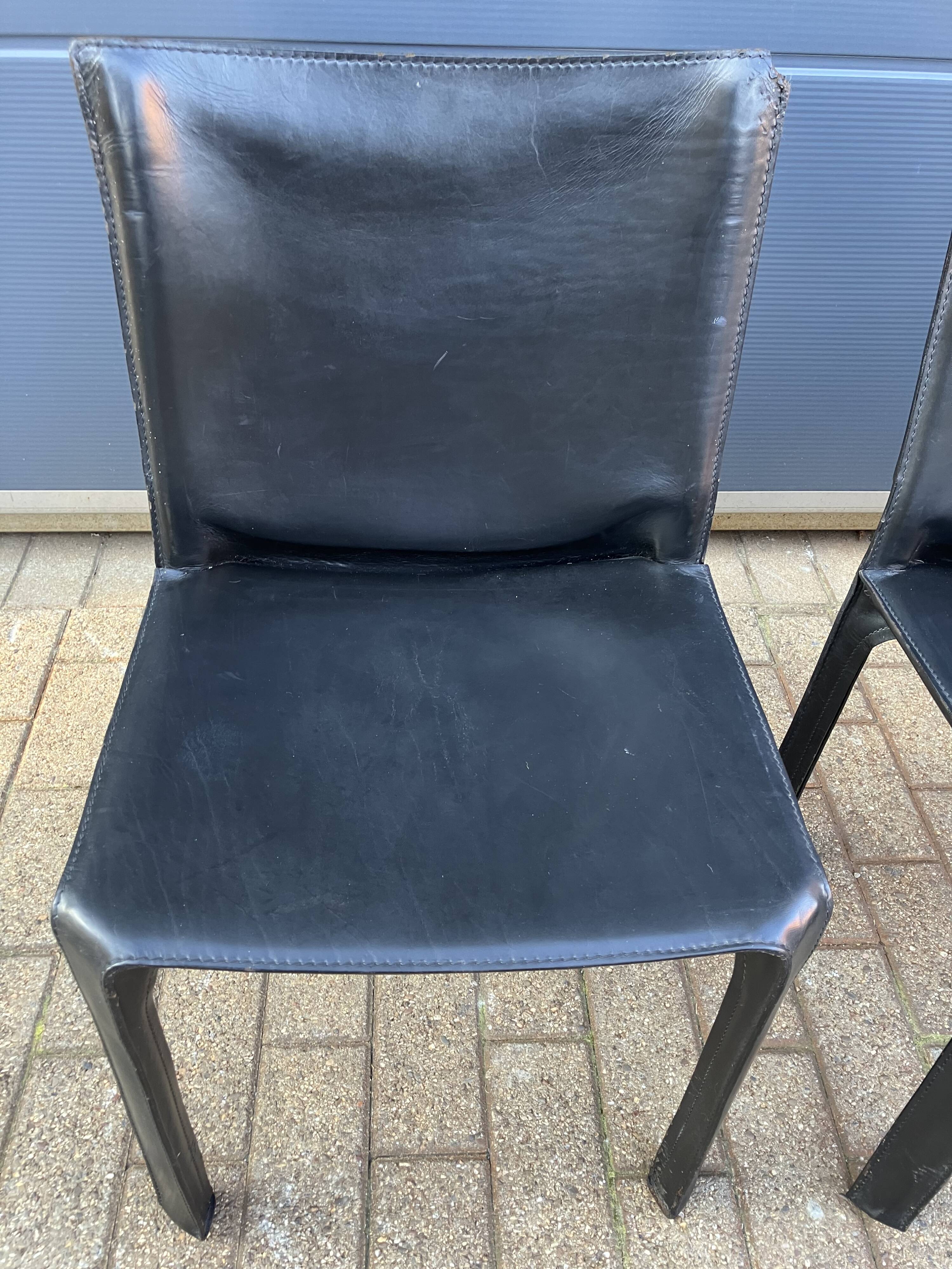 4 black Cassina Cab chairs by Mario Bellini