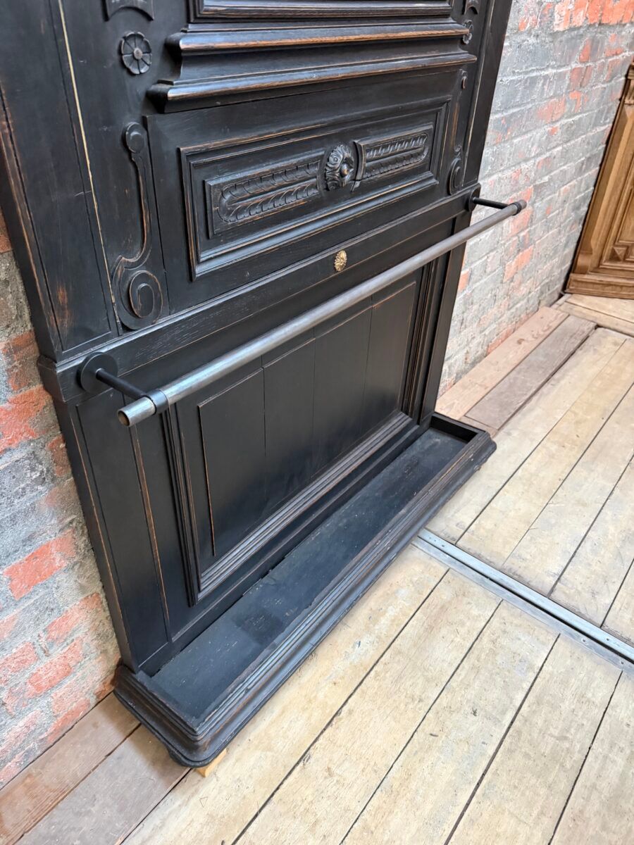 Patinated oak wardrobe from the early 20th century.