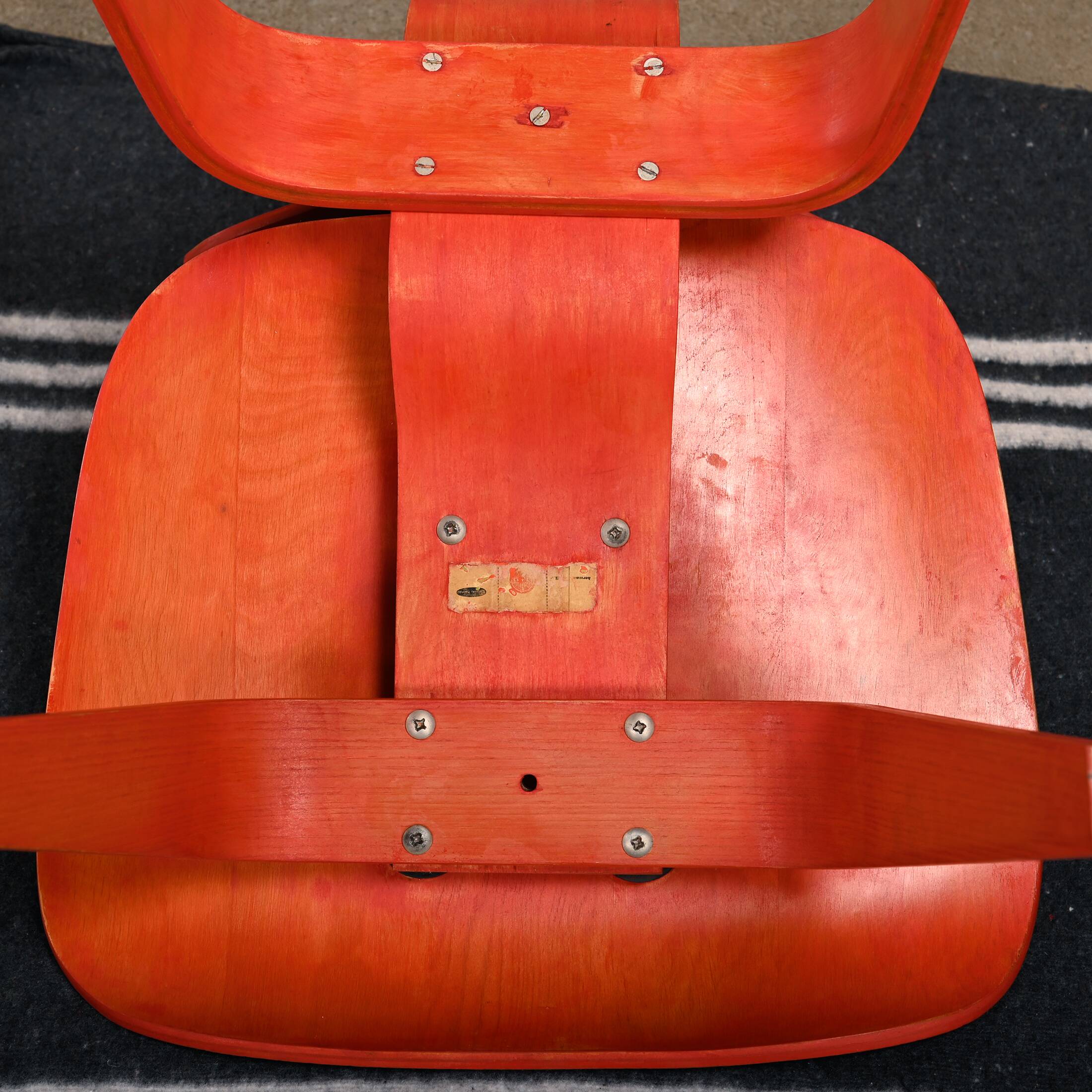 Charles & Ray Eames Early DCW Red aniline dye Ash Dining Chair for Evans Plywood