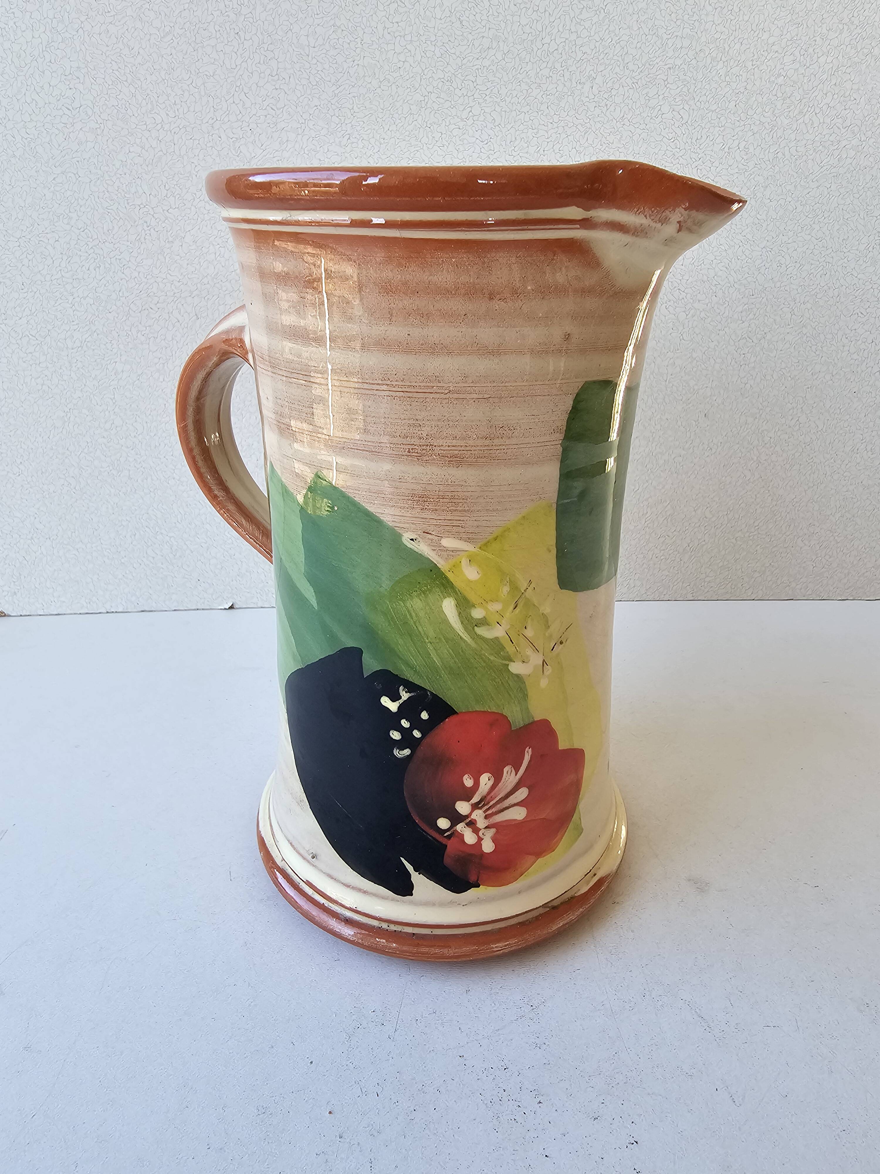 Ceramic jug with Provencal floral pattern signed (Signature to be identified)
