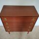 Chest of drawers with spindle legs
