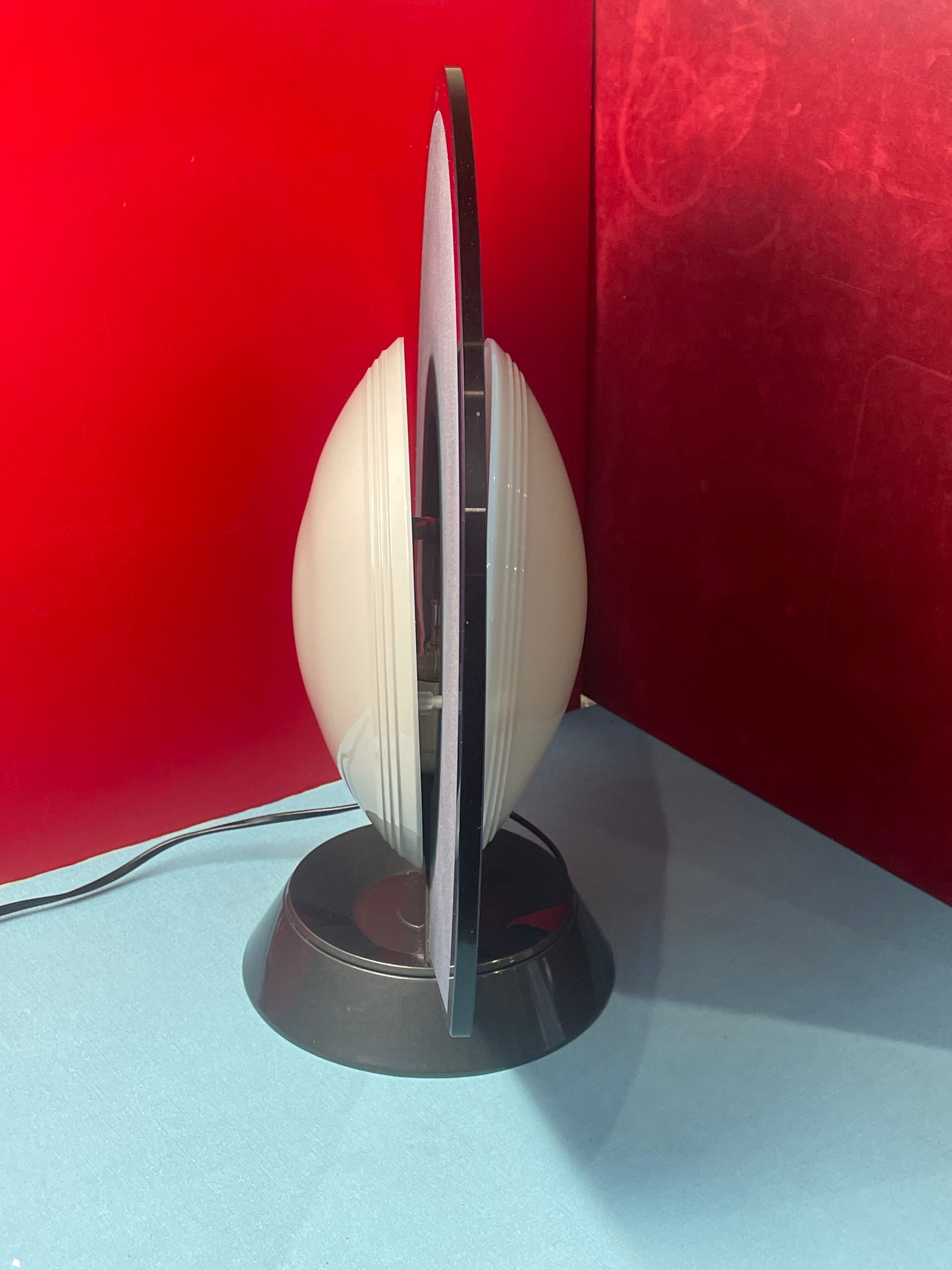 Rotating lamp Gong by Bruno Gecchelin, Arteluce Italy design
