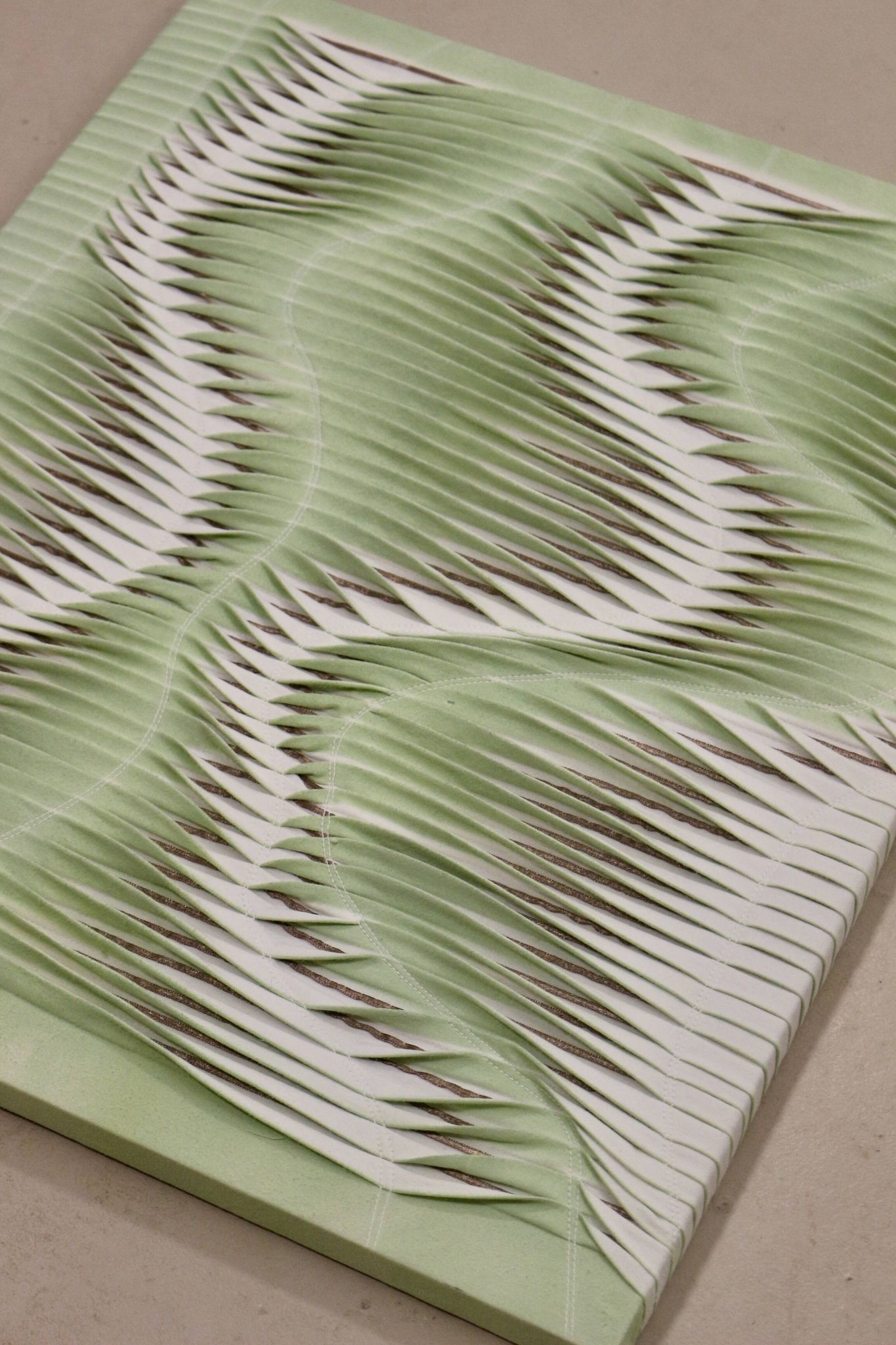 Textured wave effect painting by pleating in light green color. Contemporary. Ref Riviera